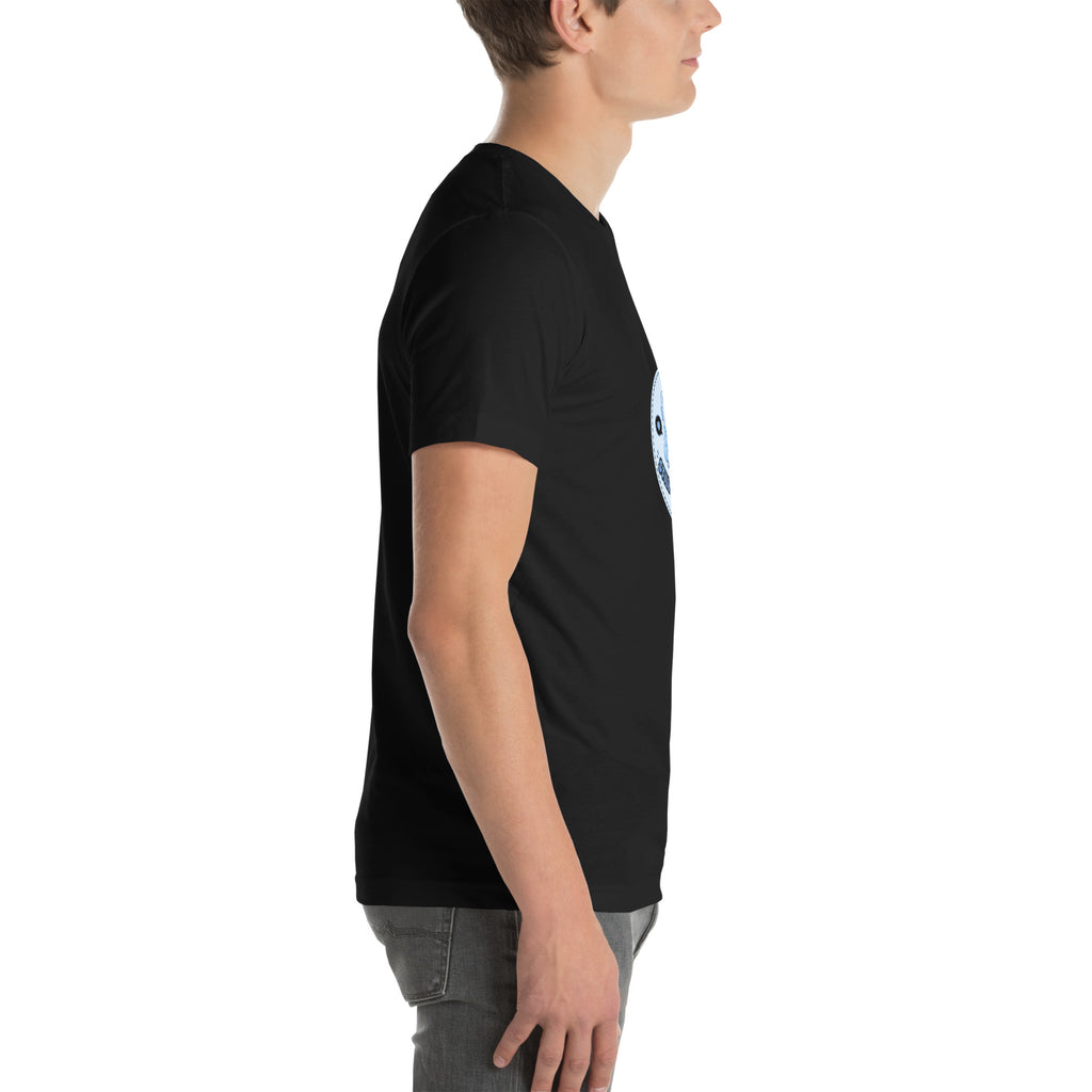 Debug Badge tee STILL DEBUGGING — cute coding robot graphic tee mockup